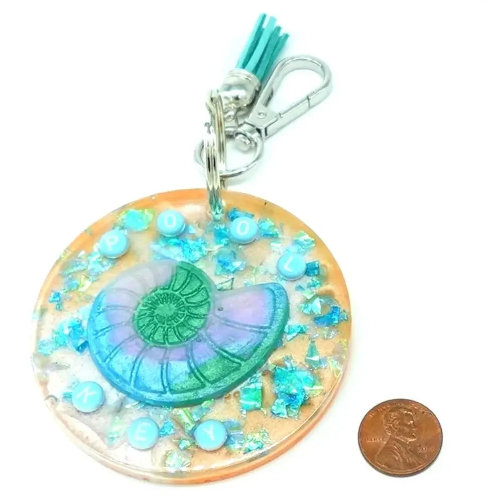 Tropical  Nautilus Shell resin Keychain with teal accents!  POOL KEY Chain